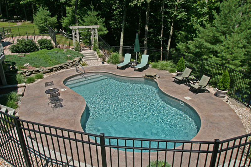 Swimming pool and stamped concrete project example 3
